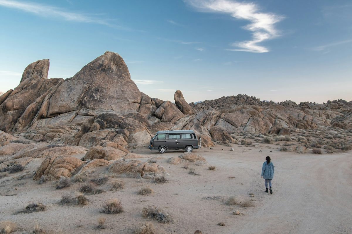 woman traveler with camper van
