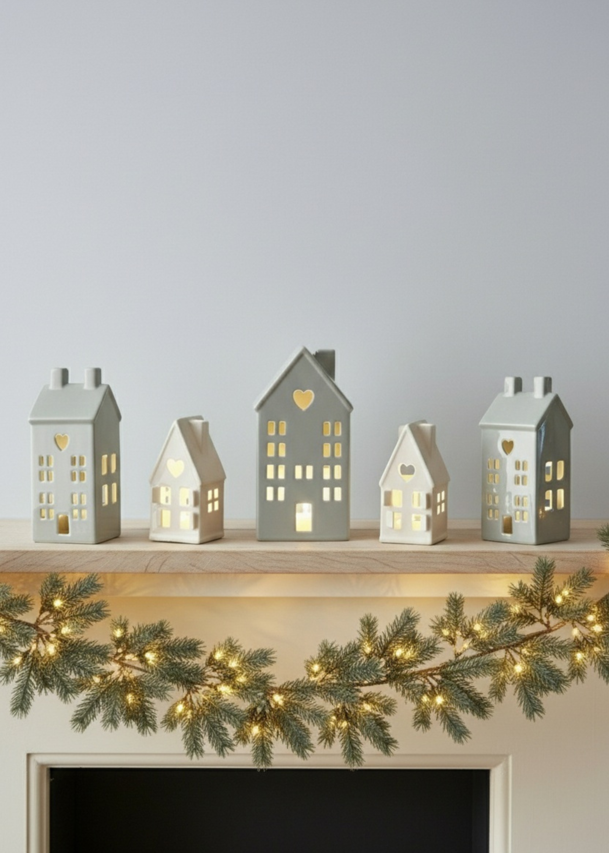 Truly Lifestyle Ceramic Christmas Houses On Mantle Piece with Light Up Garland