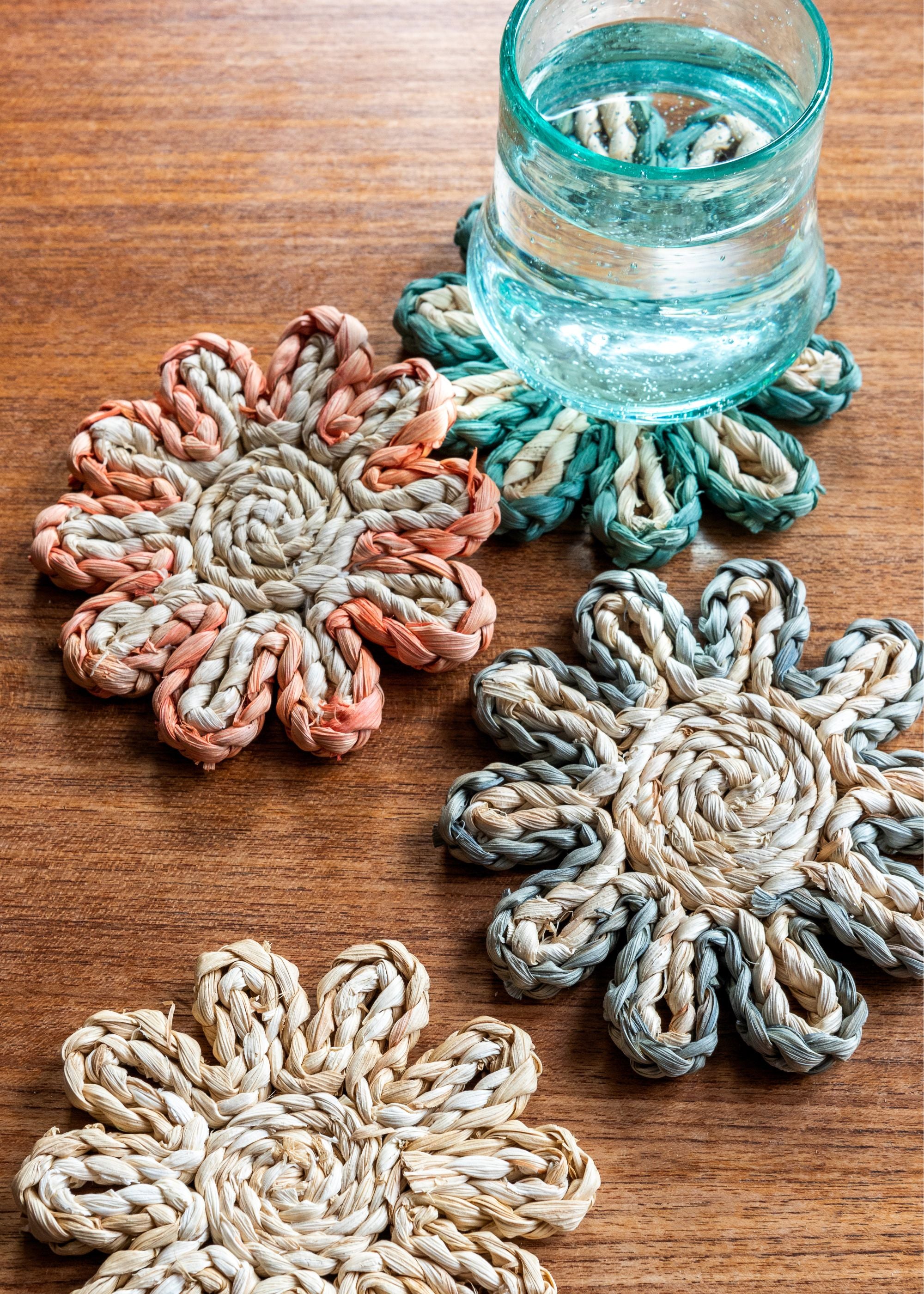 TRULY LIFESTYLE HUSK COASTER WITH BLUE STITCHING WITH ORANGE AND NATURAL COLOURED ONES