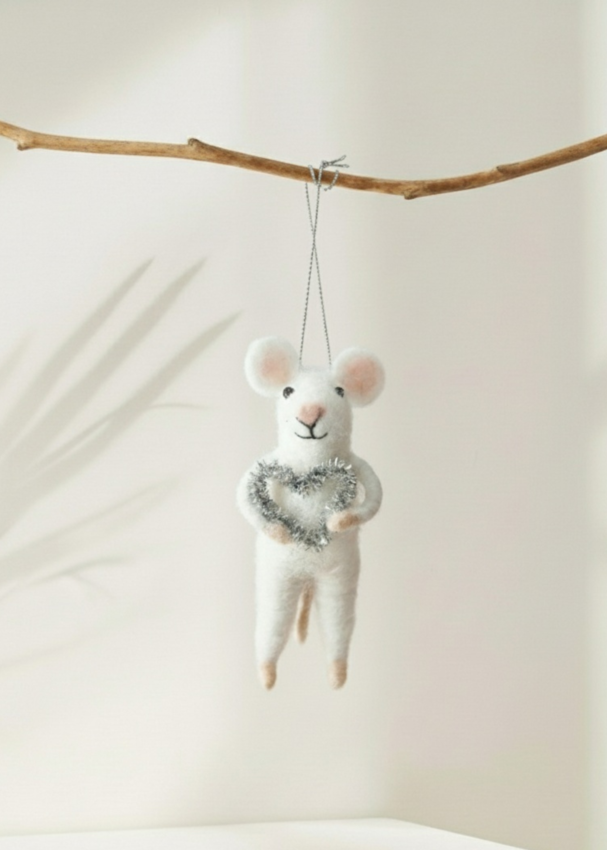 Truly Lifestyle White Christmas Mouse Holding a tinsel heart