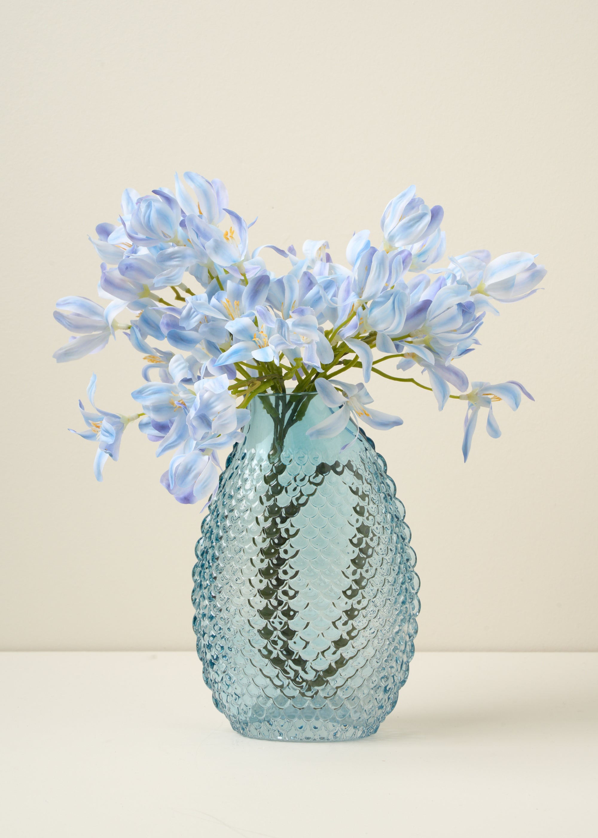 TRULY LIFESTYLE LIGHT BLUE BOBBLE VASE FILLED WITH FLOWERS