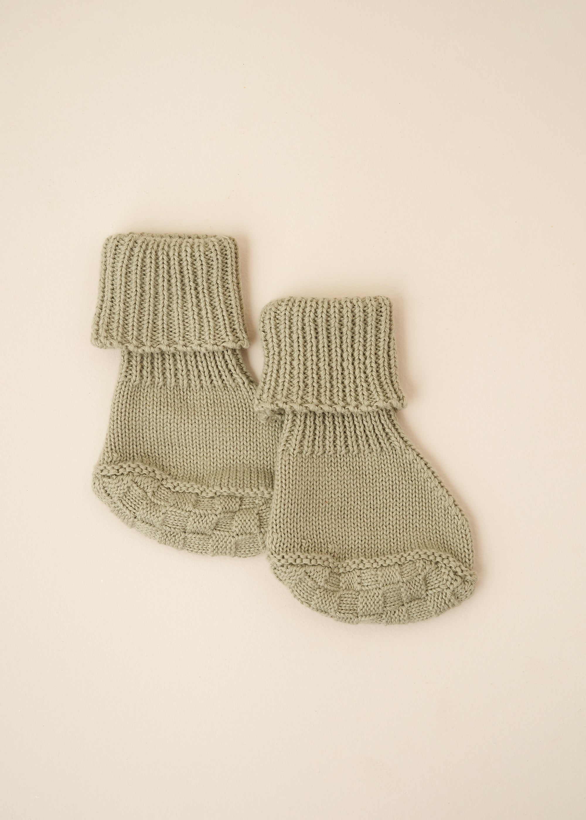 TRULY LIFESTYLE SAGE KNITTED PAIR OR BABY BOOTIES