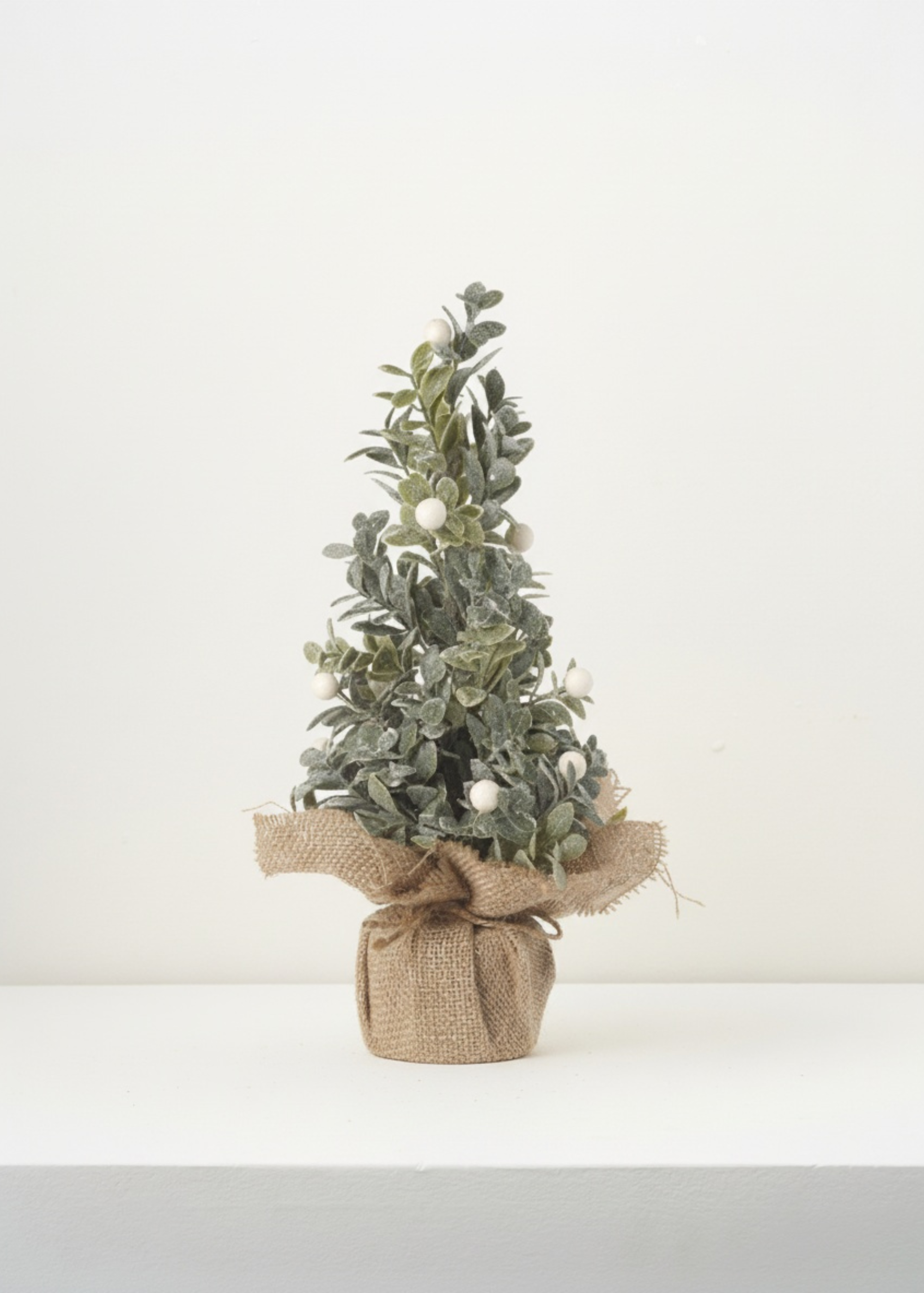 truly Lifestyle Christmas Small decorative tree wrapped in burlap on a white background