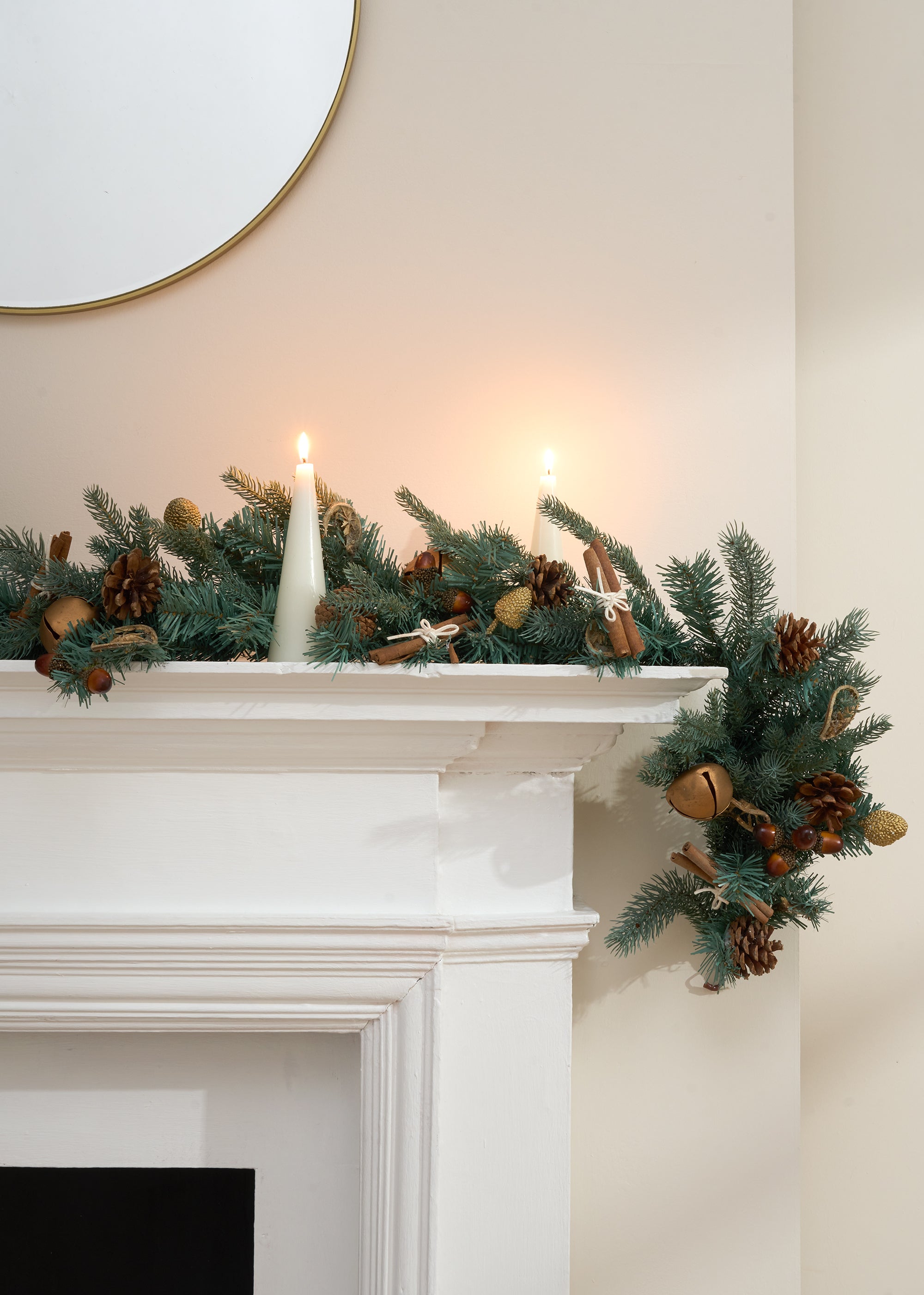 TRULY LIFESTYLE DRIED CINNAMON, ORANGE AND BROZE BELL CHRISTMAS GARLAND ON MANTEL