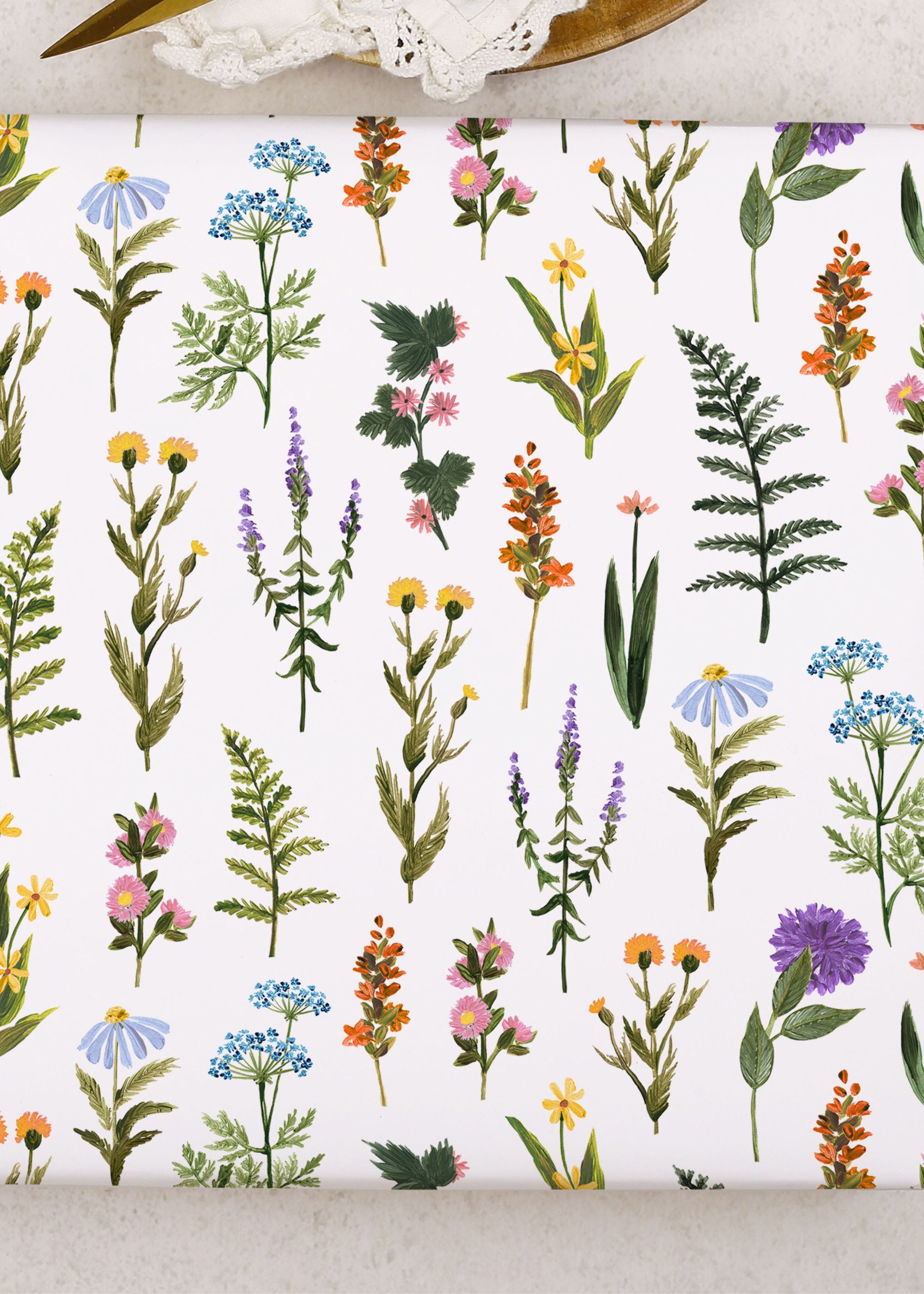 TRULY LIFESTYLE FERN AND FLOWER WRAPPING GIFT PAPER ON TABLE