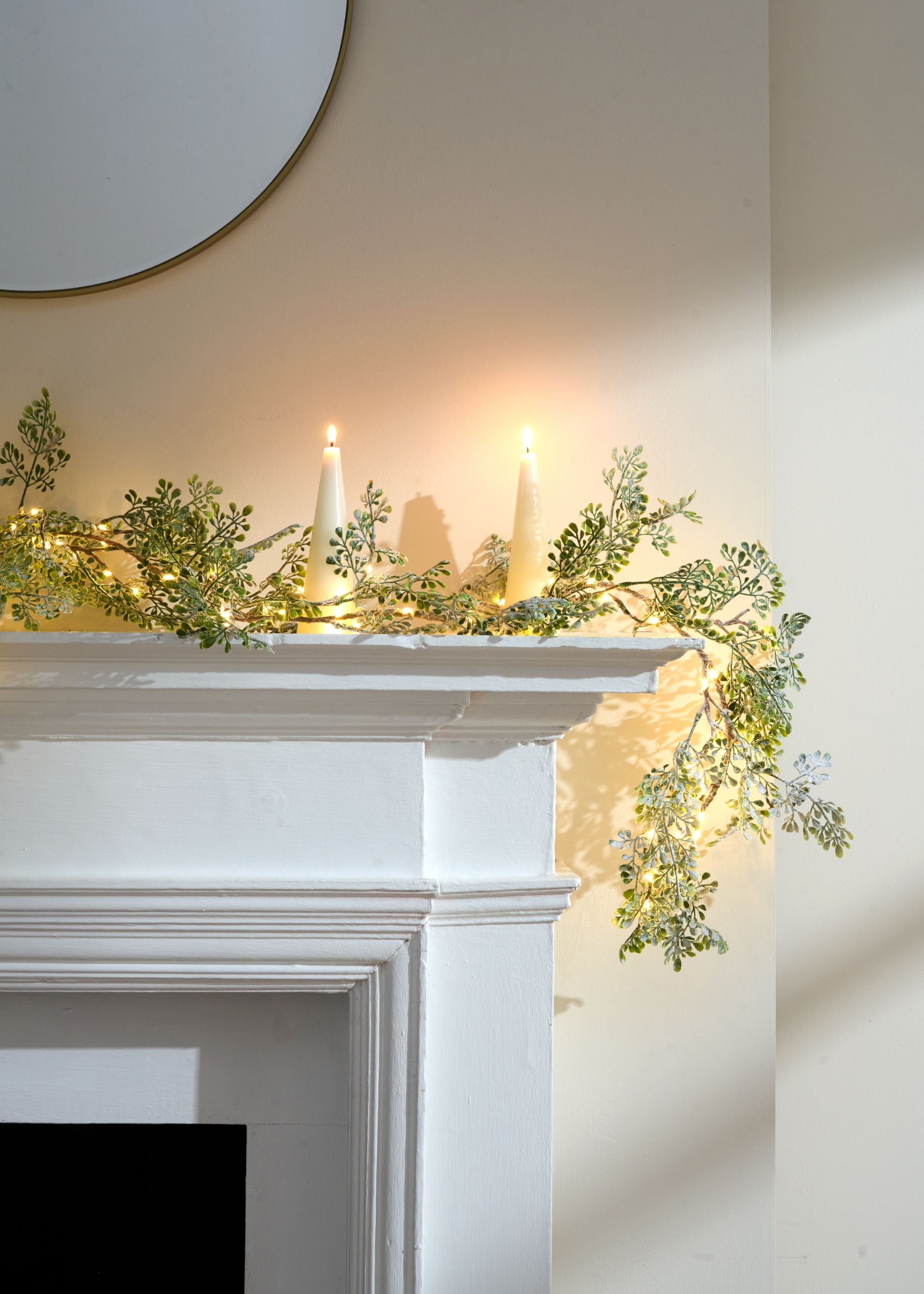 TRULY LIFESTYLE LIGHT UP EVERGREEN GARLAND ON MANTEL