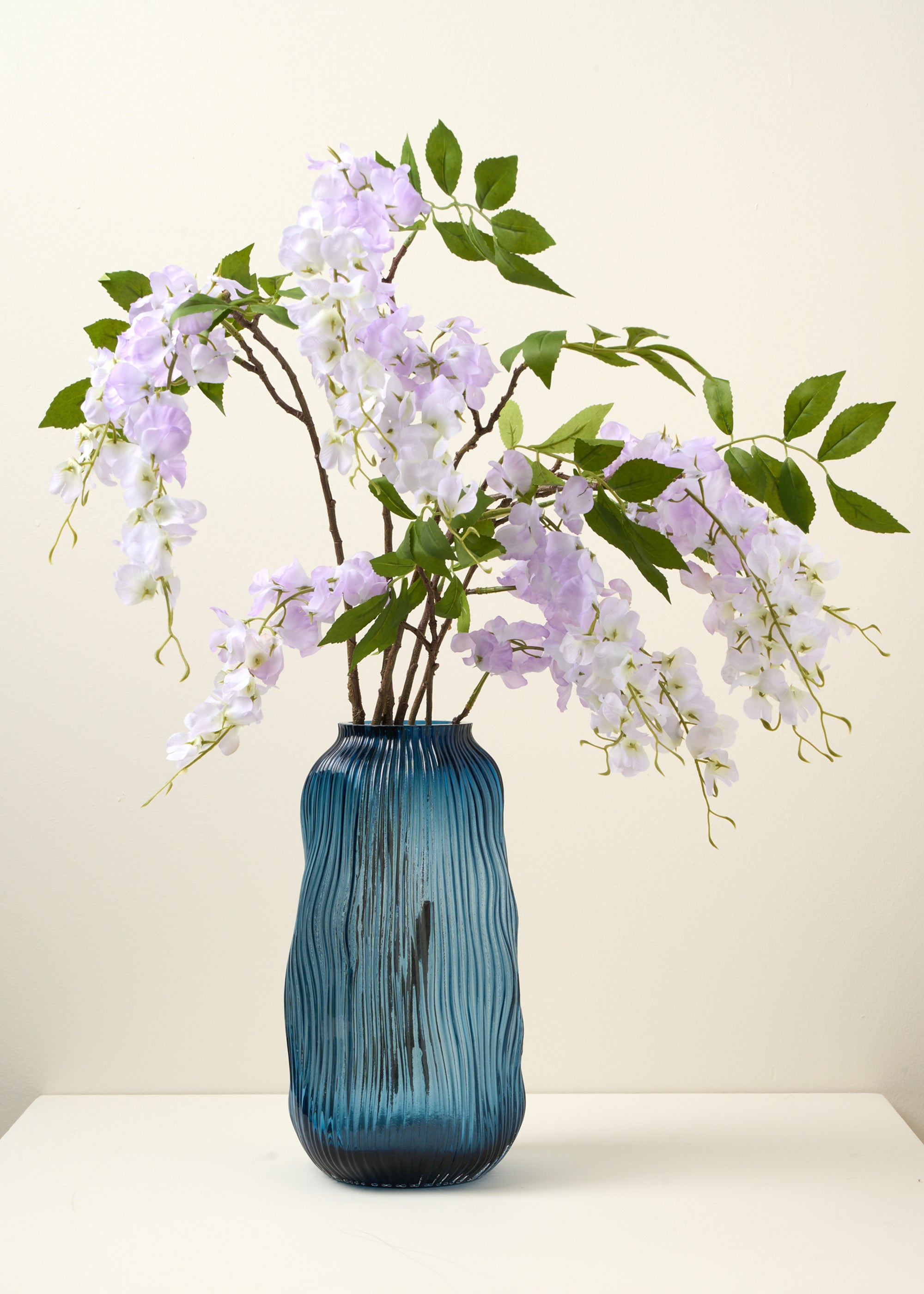 TRULY LIFESTYLE PURPLE ALLIUM SINGLE STEMS IN BLUE VASE