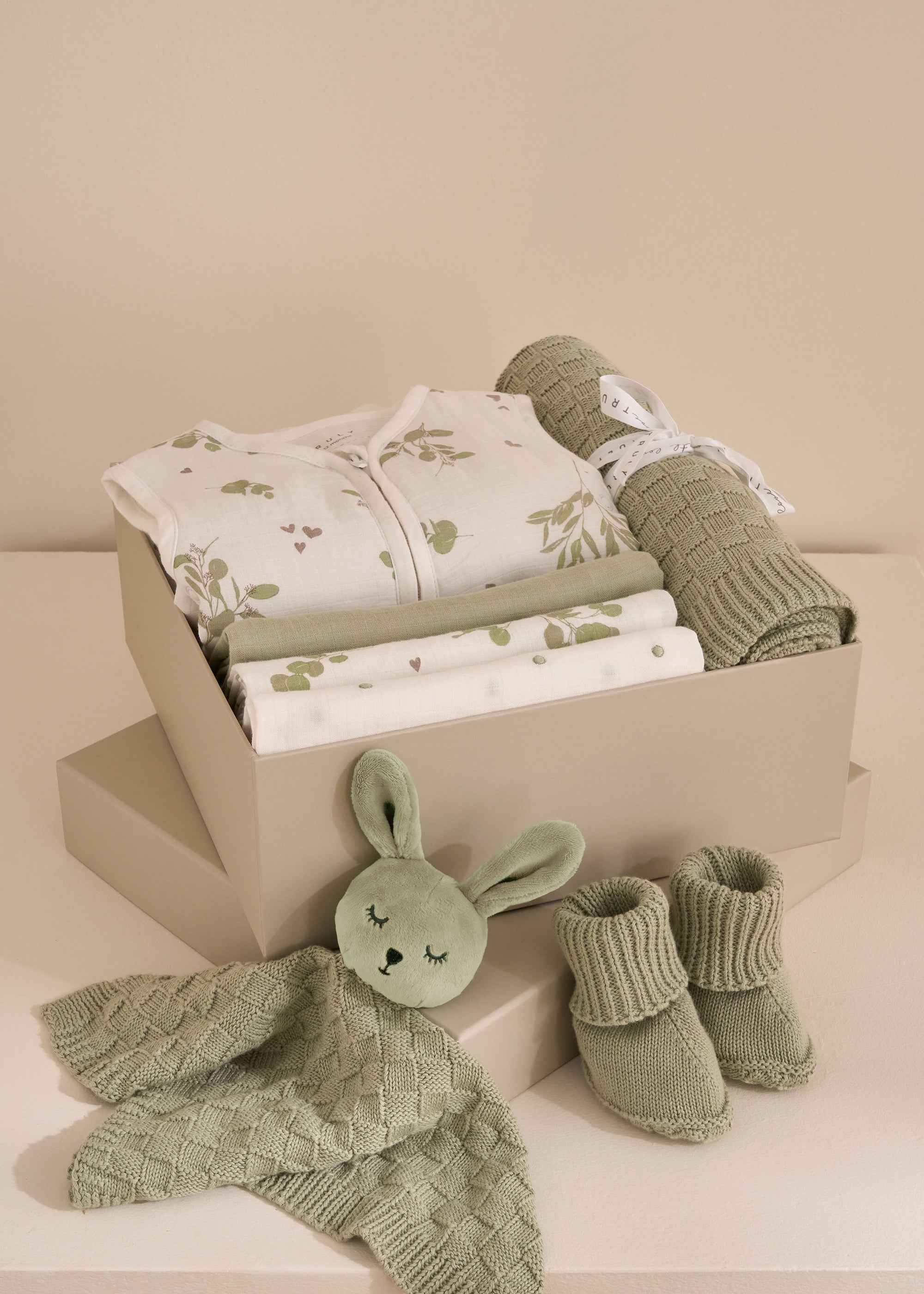 sage green knitted baby comforter