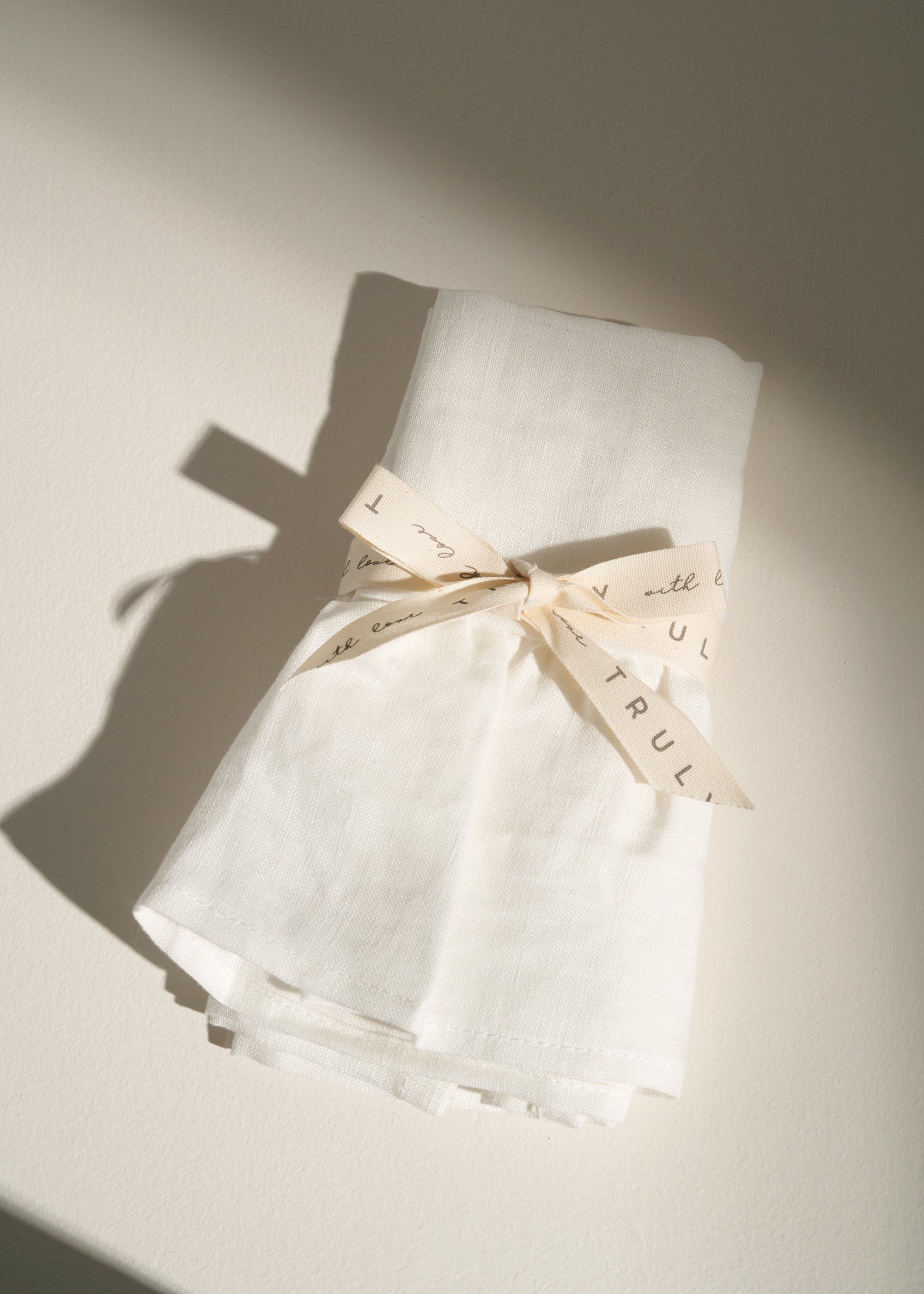 truly lifestyle white linen tea towel folded