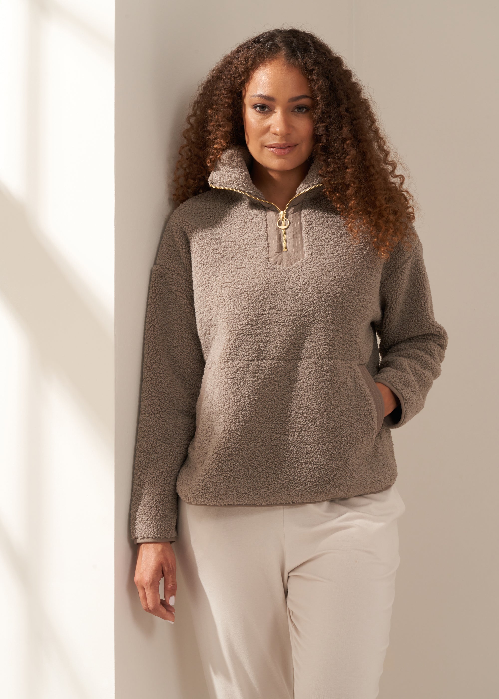 TRULY LIFESTYLE WOMENS OATMEAL BOUCLE QUARTER ZIP JUMPER ON MODEL WITH ECRU HAREEM JOGGERS