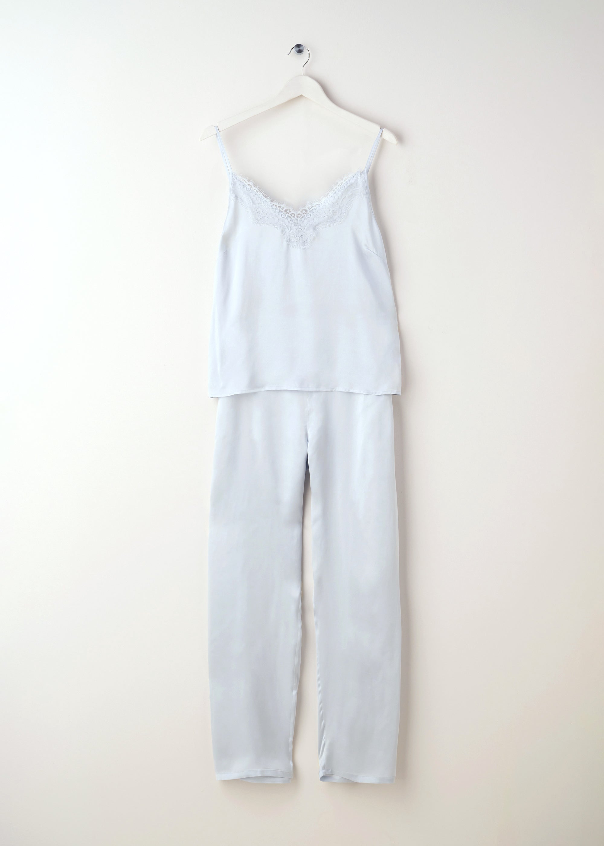 Dusty blue silk camisole and trouser set hanging | Truly Lifestyle