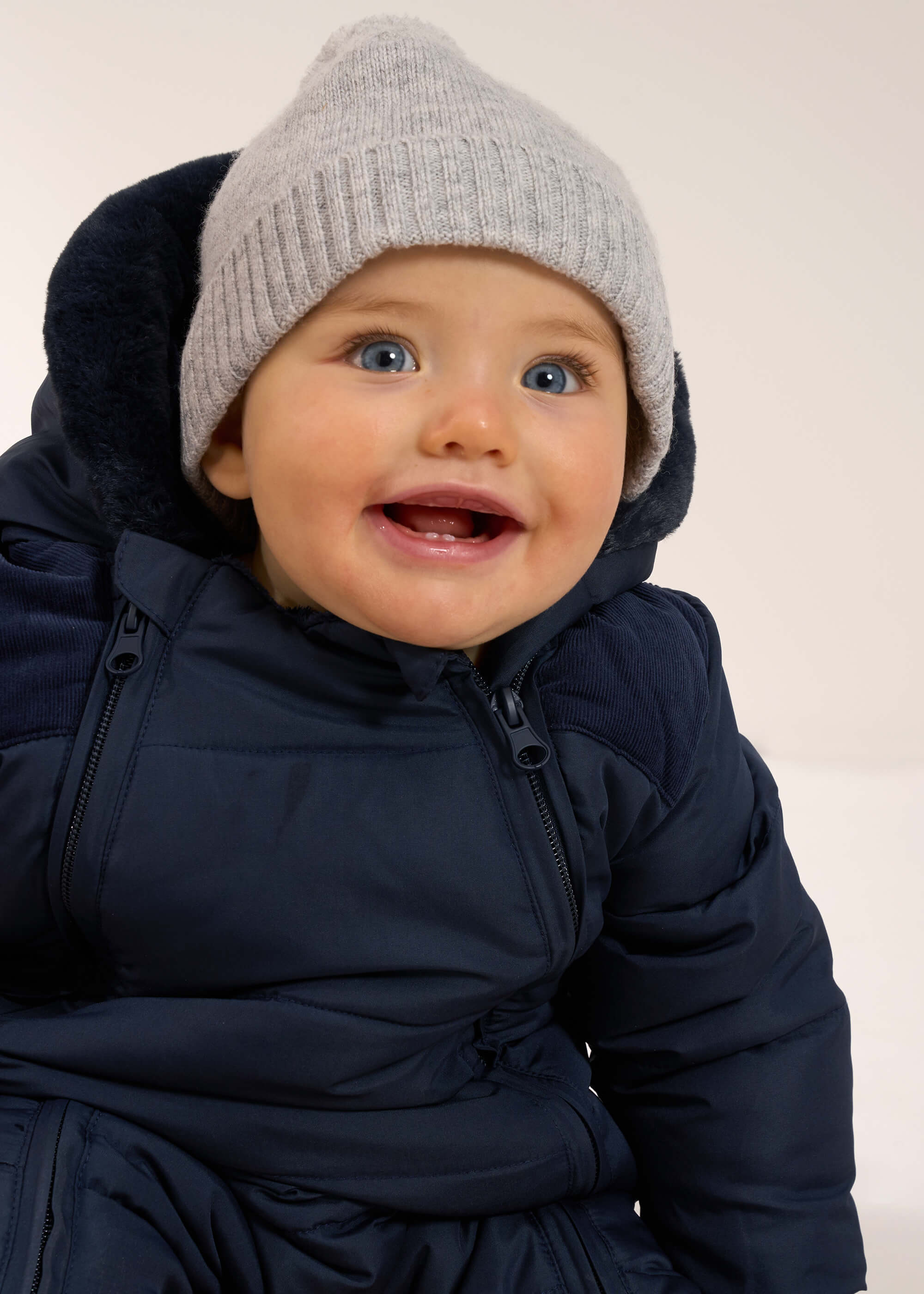 TRULY LIFESTYLE GET BABY HAT ON BABY IN SNOWSUIT