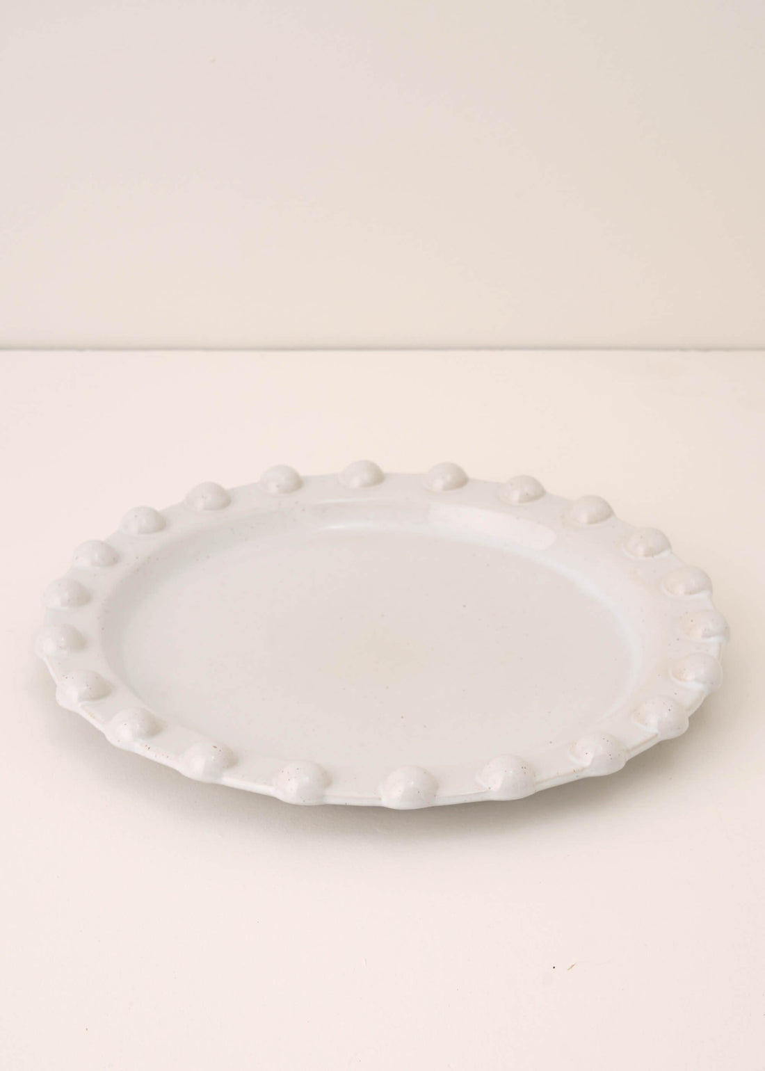 TRULY LIFESTYLE POM POM EDGED PALE GREY ROUND SERVING PLATTER