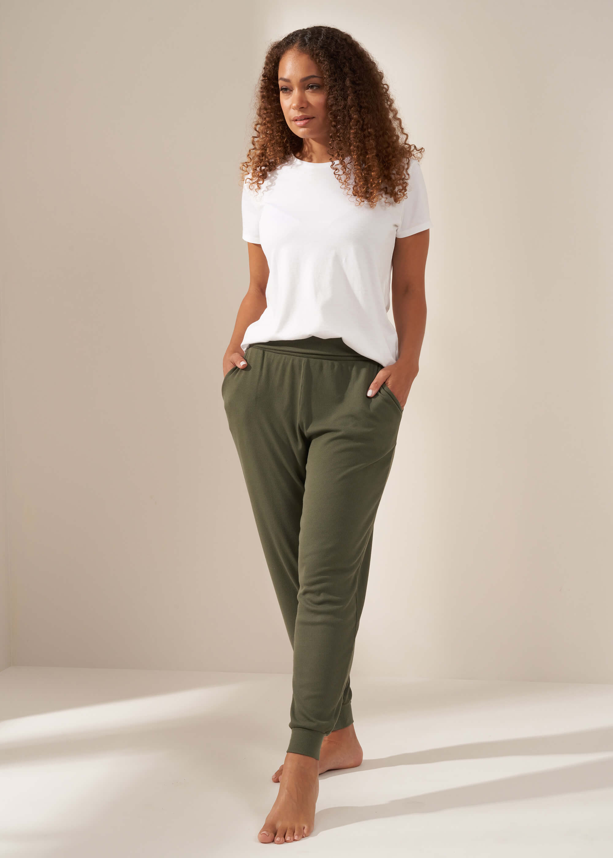 TRULY LIFESTYLE KHAKI GREEN RIBBED HAREEM PANTS ON MODEL WITH WHITE TSHIRT