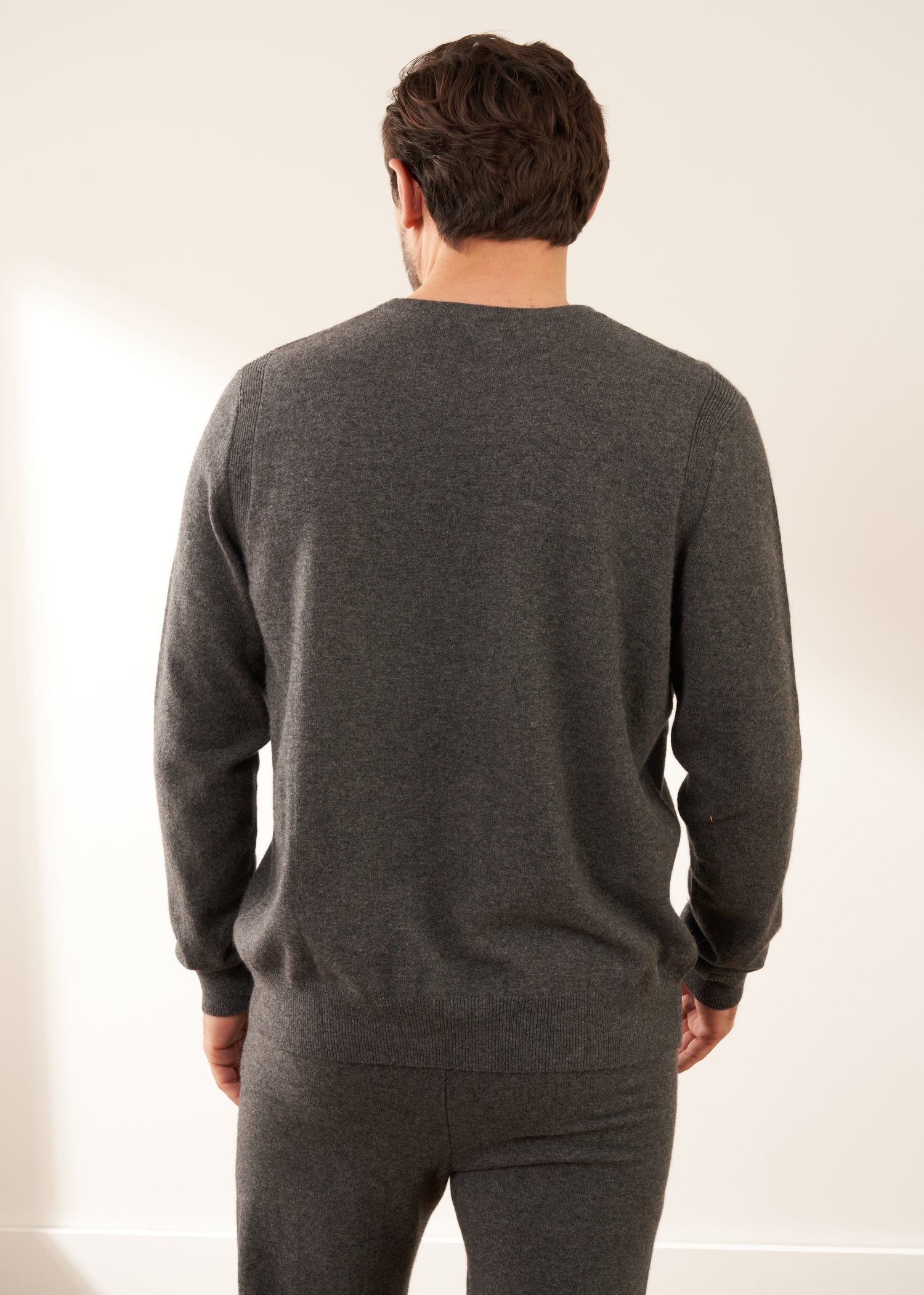 Mens Grey Cashmere Crew Neck Jumper On Model With Cashmere Jogging Bottoms From Behind | Truly Lifestyle