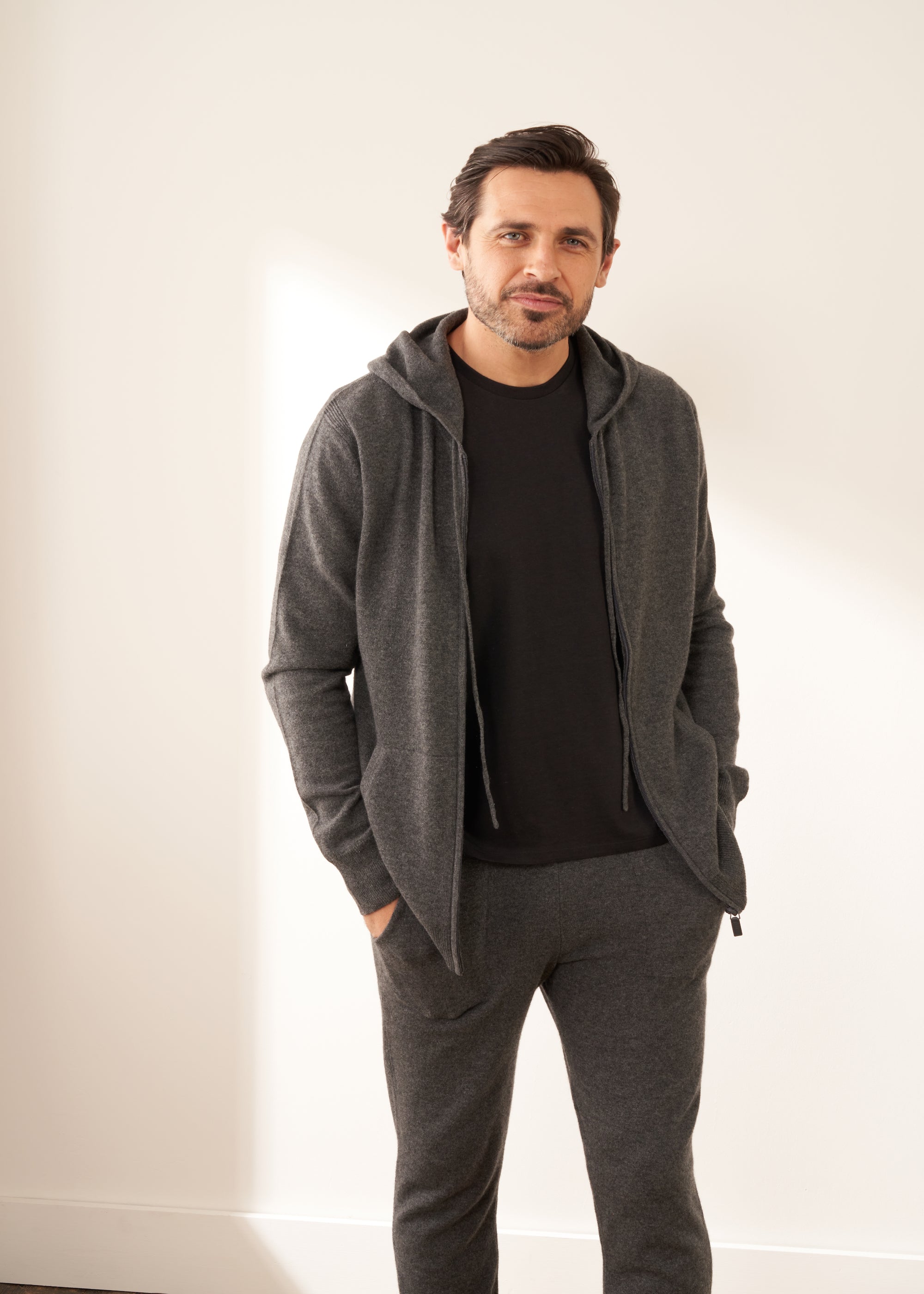 Mens Grey Cashmere Hoodie On Model With Black Tshirt And Cashmere Joggers | Truly Lifestyle