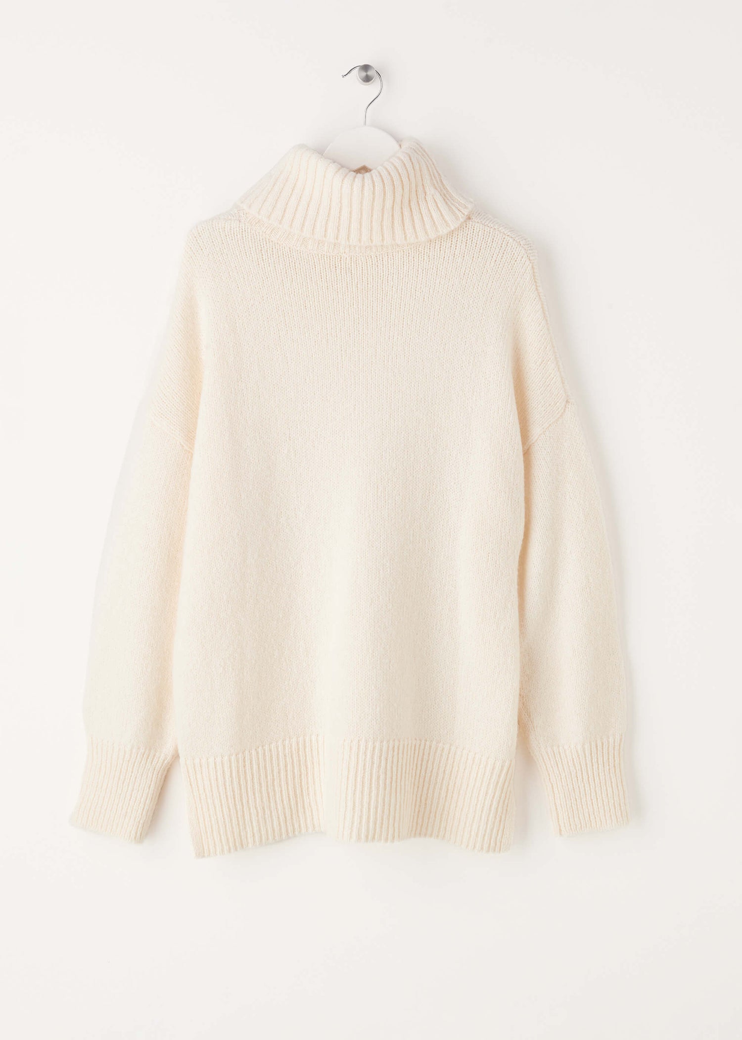 Truly Lifestyle Womens Cream Roll Neck Jumper On Hanger | Truly Lifestyle