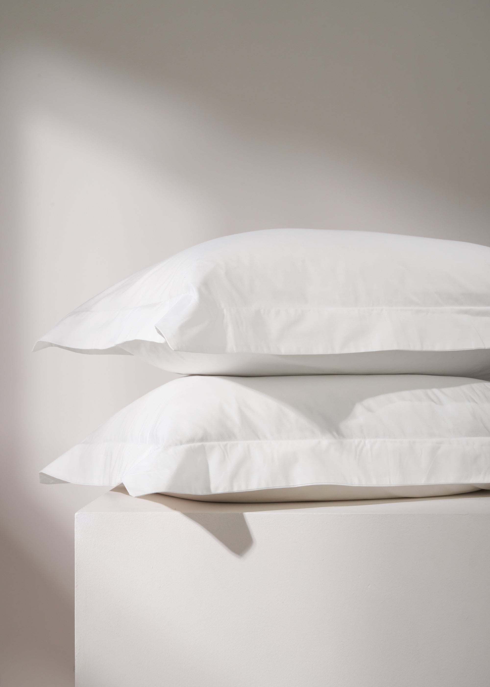 TRULY LIFESTYLE PLAIN WHITE OXFORD PAIR OF PILLOWCASES ON PILLOWS