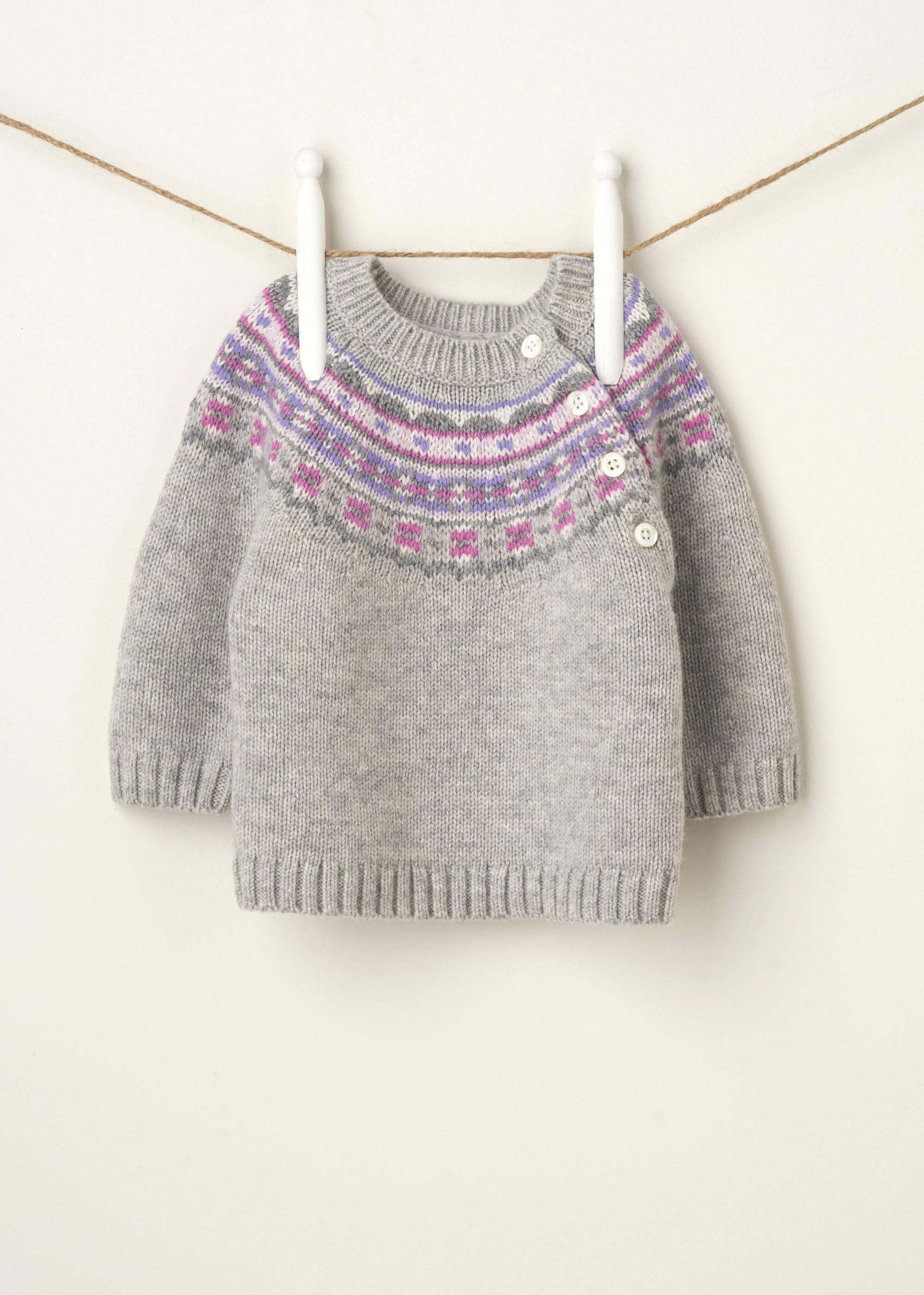 GREY FAIRISLE PRINT BABY JUMPER HANGING UP | TRULY LIFESTYLE