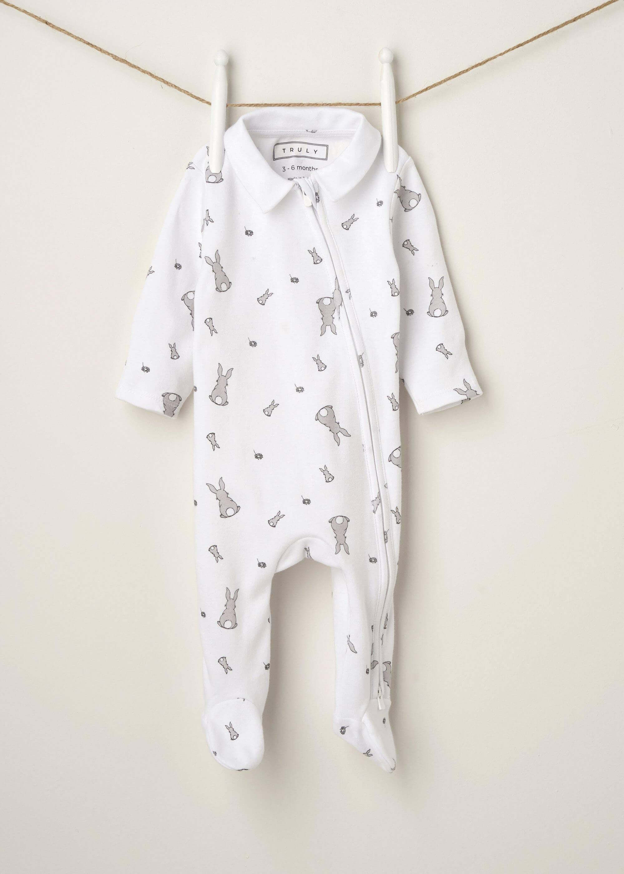 WHITE BUNNY PRINT BABY GROW HANGING UP | TRULY LIFESTYLE