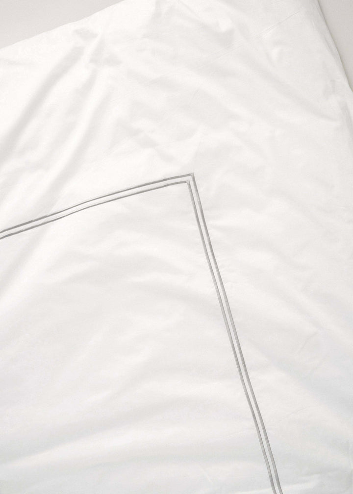 WHITE SATIN BEDDING WITH GREY STITCHING CLOSE UP | TRULY LIFESTYLE