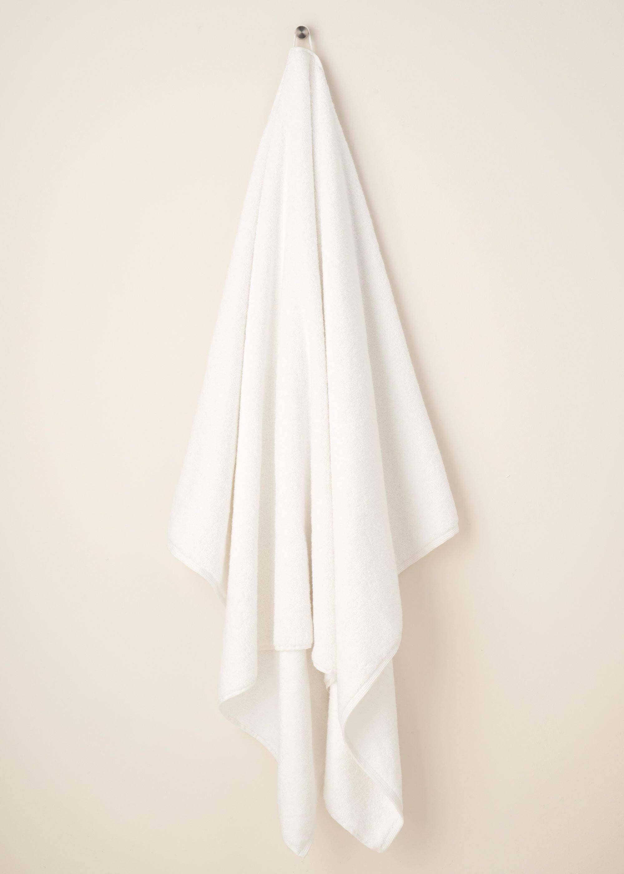 White Turkish Cotton Bath Towel Hanging Up | Truly Lifestyle