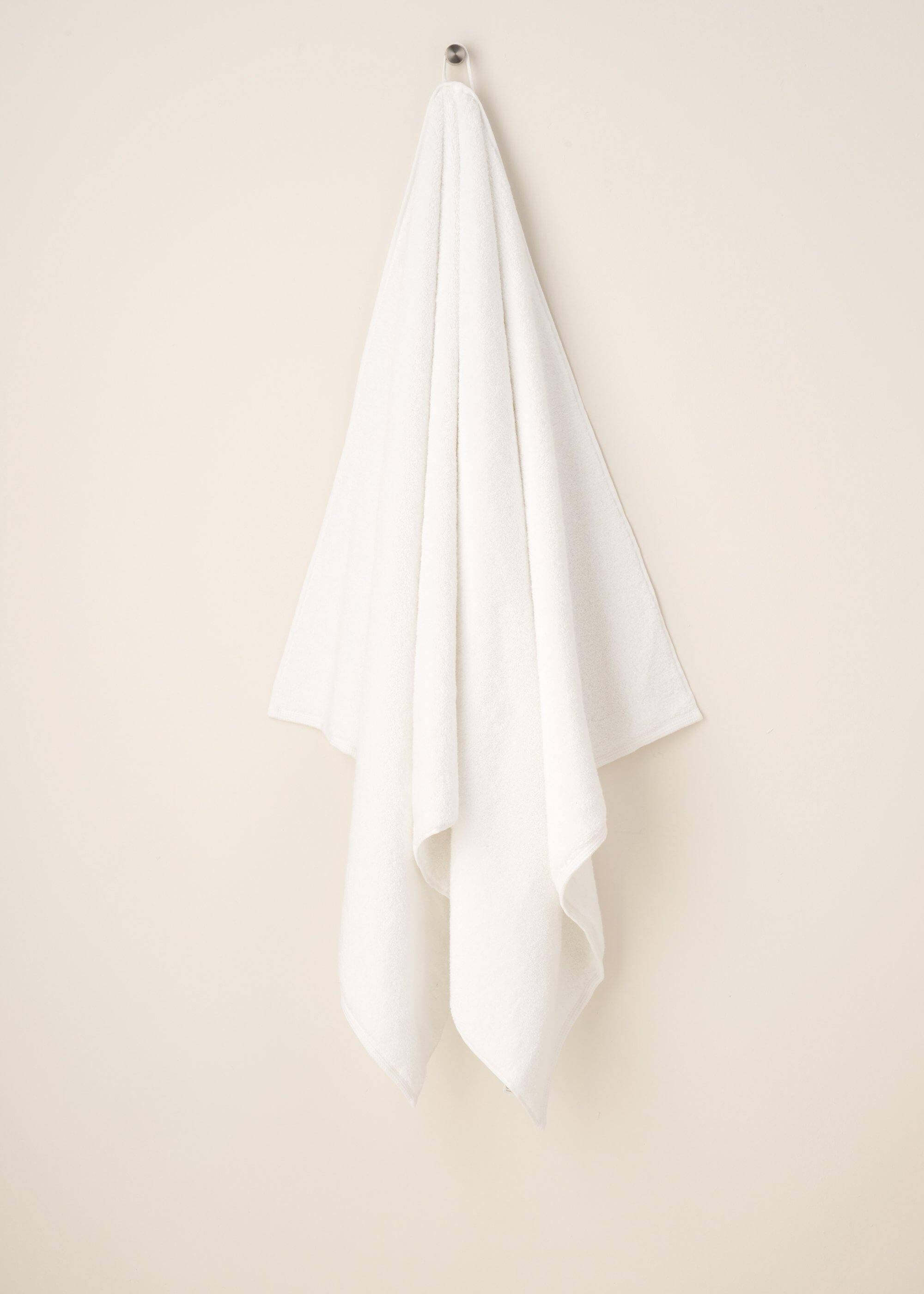 White Turkish Cotton Bath Towel Hanging Up | Truly Lifestyle