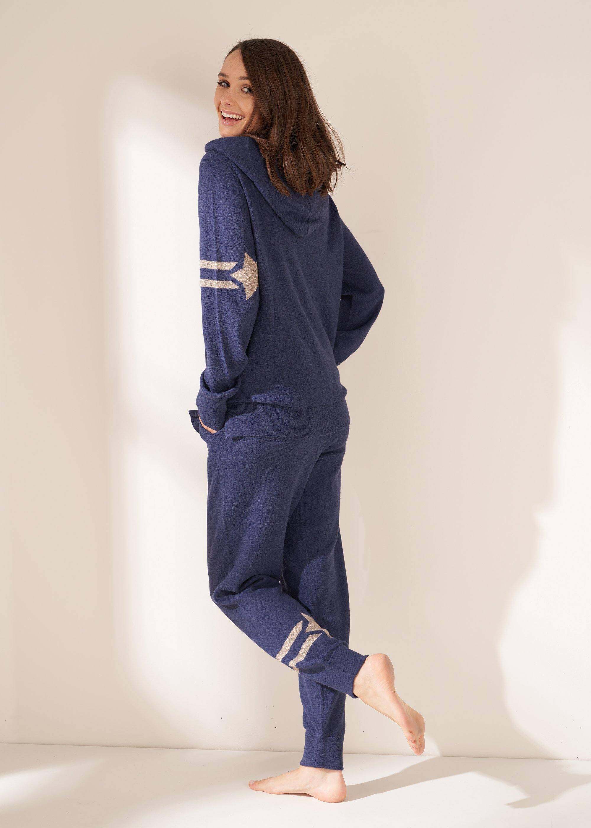 Model Wearing Navy Yak Jogging Bottoms and Hoodie Standing | Truly Lifestyle