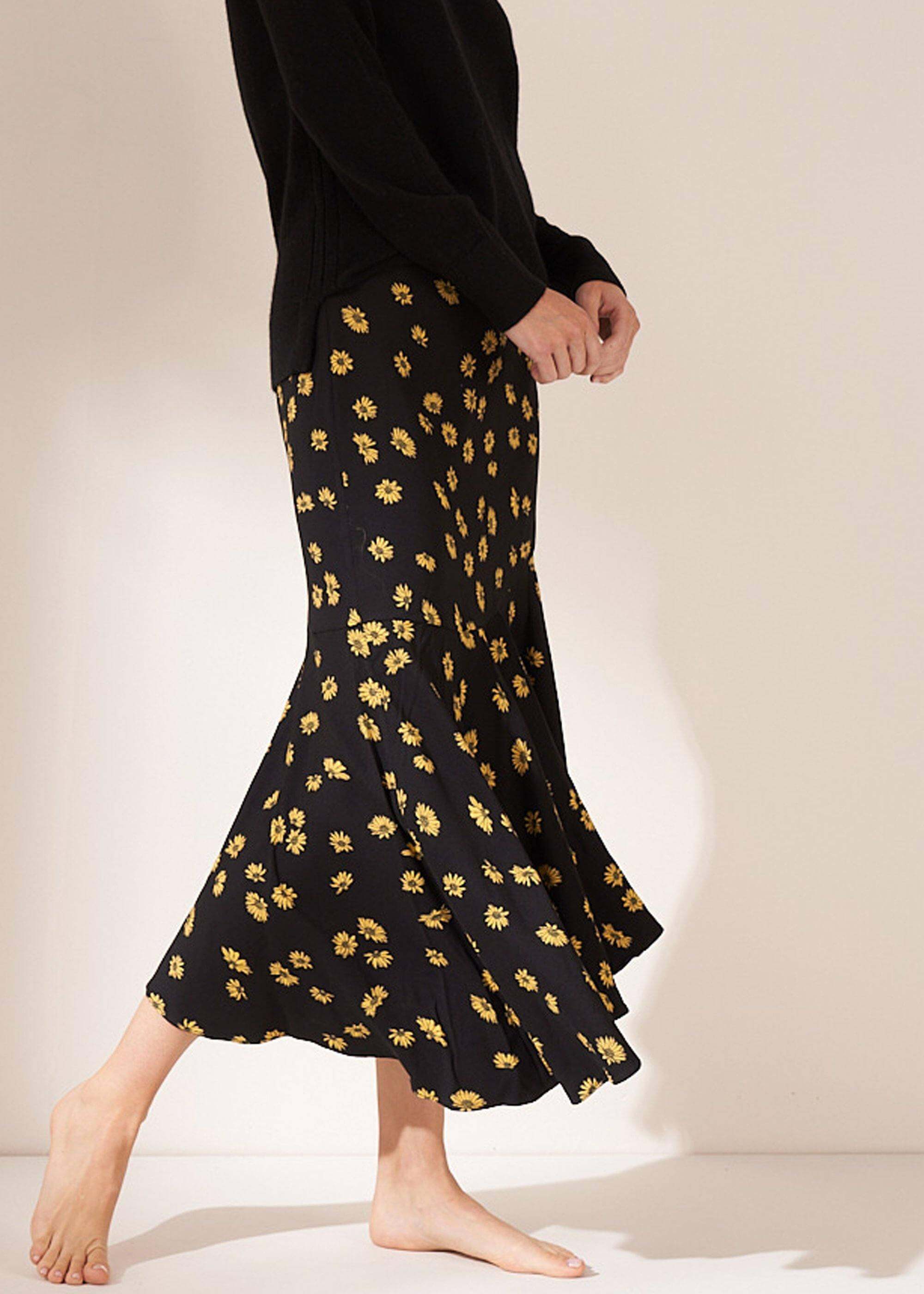 Womens Black Asymmetric Daisy Print Midi Skirt On Model | Truly Lifestyle