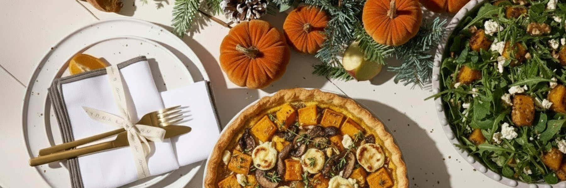 Truly Lifestyle Seasonal Entertaining Essentials with White napkin, pumpkins and warm winter salad
