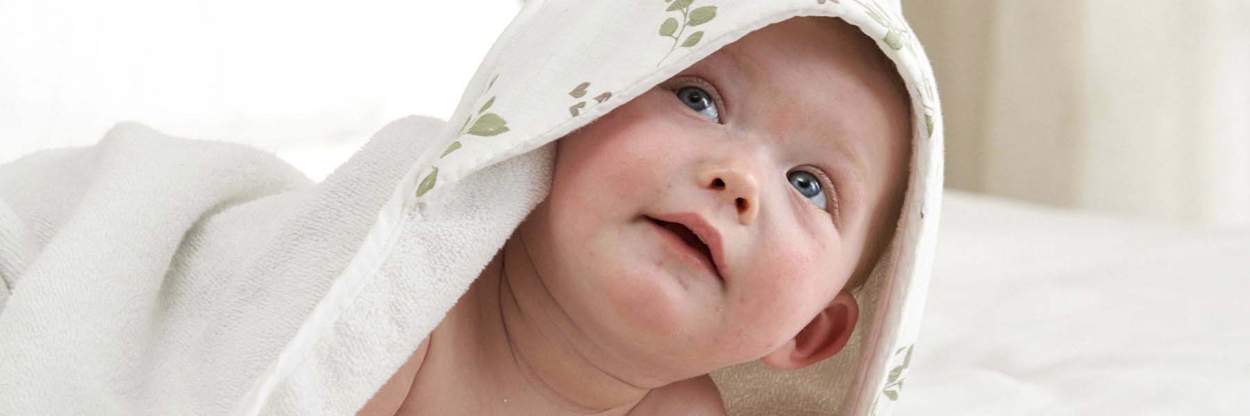 Truly Lifestyle Baby Image of Baby Wearing White Towel