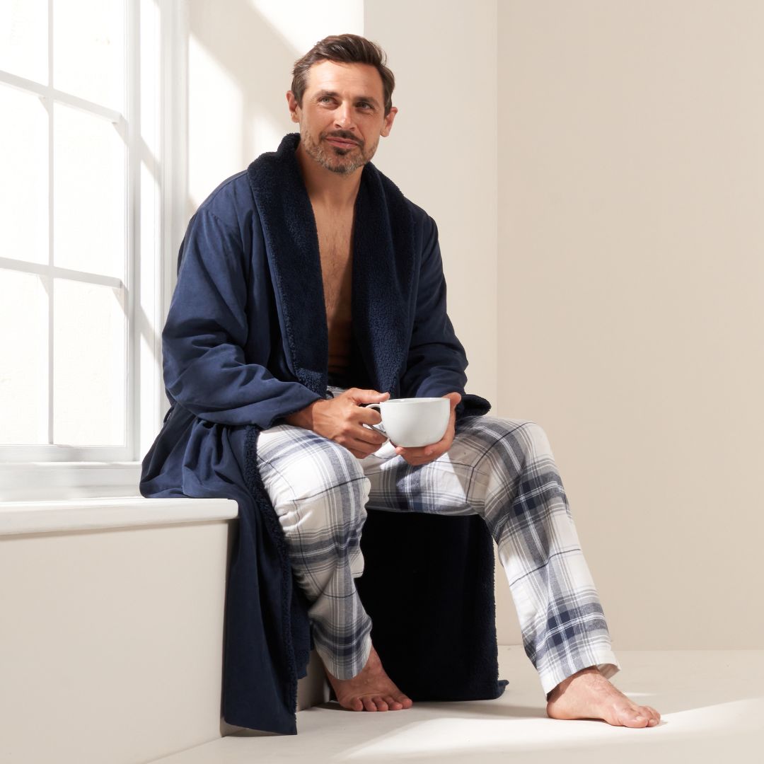 Truly Lifestyle Mens Gifting Widget With Model Wearing Navy Luxury Dressing Down and Tartan Pyjama Bottoms