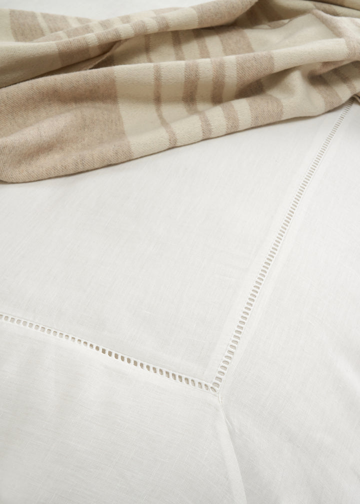 TRULY LIFESTYLE WHITE LADDER LINEN DUVET COVER ON BED CLOSE UP