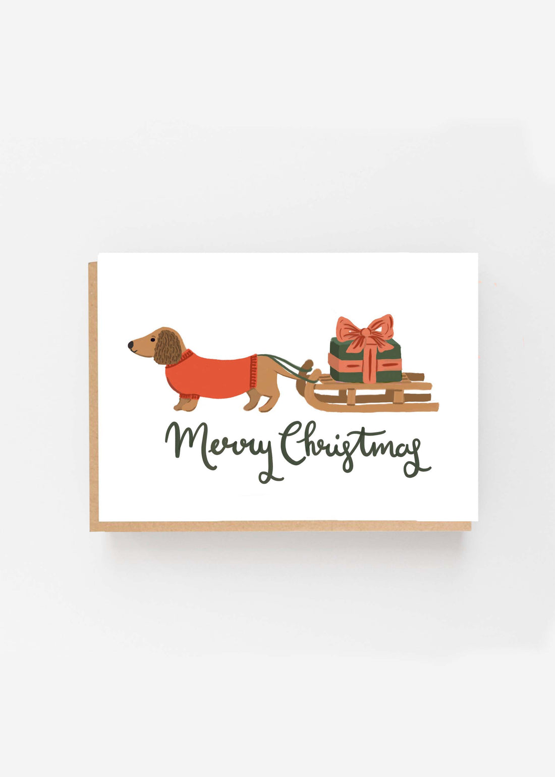 TRULY LIFESTYLE CHRISTMAS CARD WITH DACHSHUND PULLING A SLEDGE