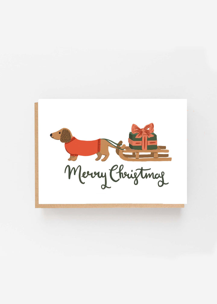 TRULY LIFESTYLE CHRISTMAS CARD WITH DACHSHUND PULLING A SLEDGE