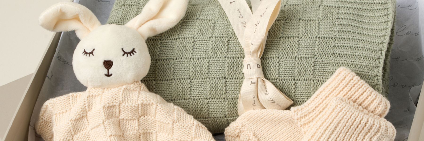 Truly Lifestyle Baby Gifting Bundle with cream bunny comforter and sage green blanket