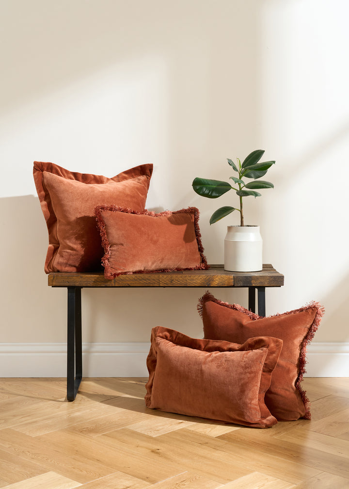 Burnt Orange Fringed and flange edged Velvet cushions in square and rectangle shape