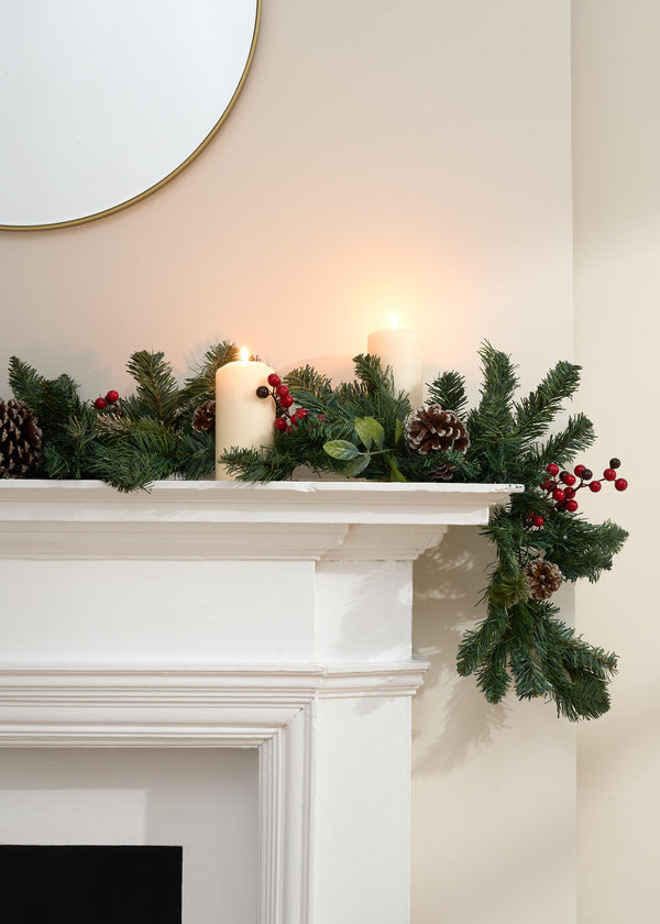 TRULY LIFESTYLE CHRISTMAS GARLAND WITH RED BERRIES AND PINECONES ON FIREPLACE