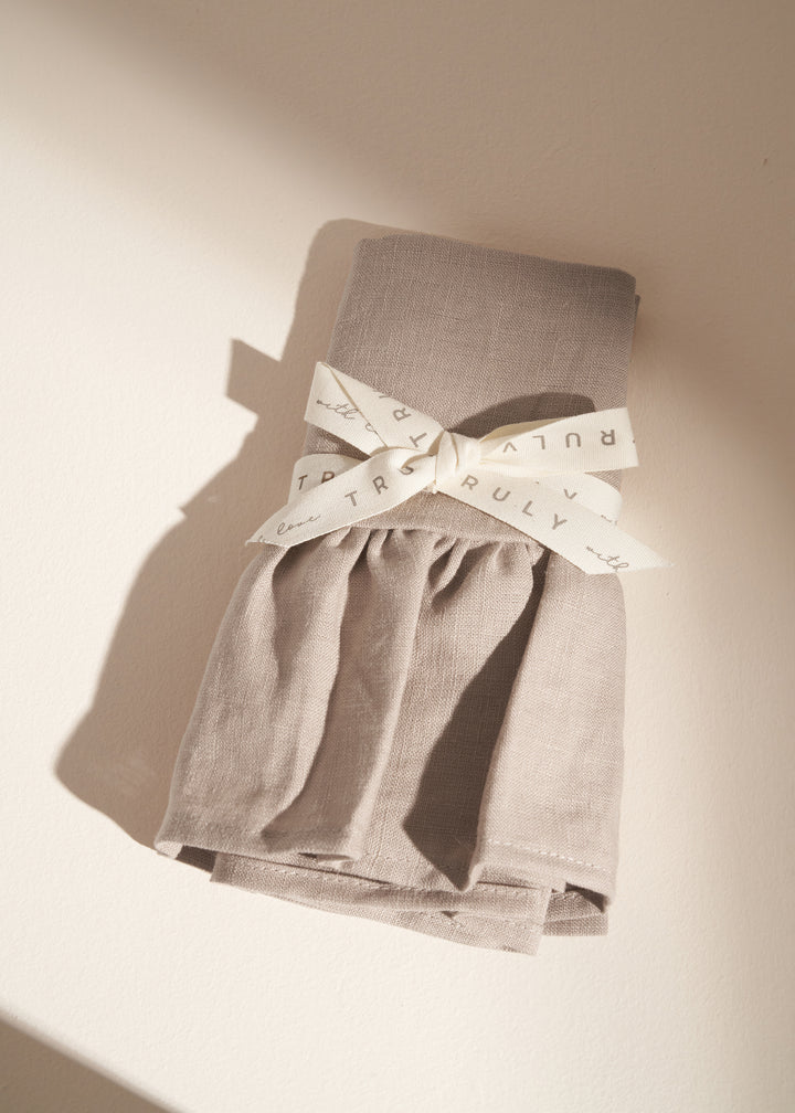 TRULY LIFESTYLE LINEN TEA TOWEL IN TAUPE  FOLDED