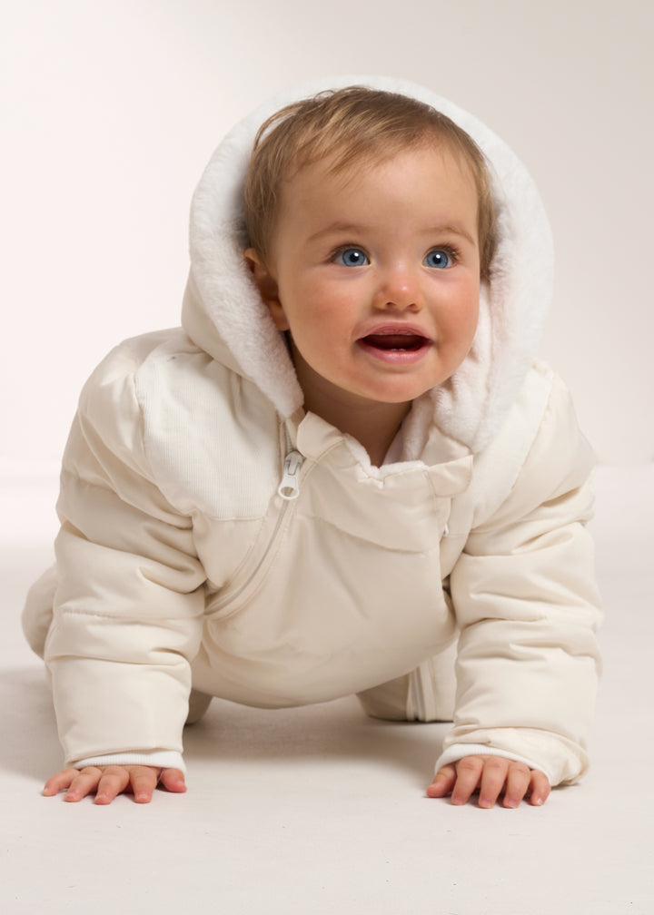 Truly Lifestyle Ivory Baby Snowsuit On Baby With Faux Fur Hood Up