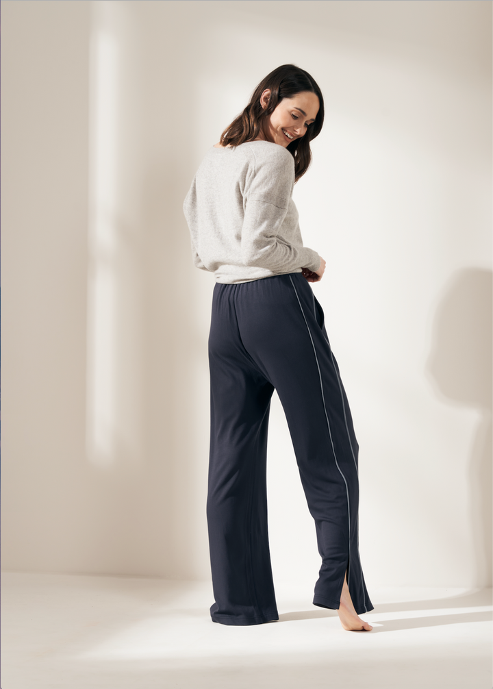 NAVY BLUE BAMBOO WIDE LEGGED JOGGING BOTTOM ON MODEL WITH GREY CASHMERE JUMPER| TRULY LIFESTYLE