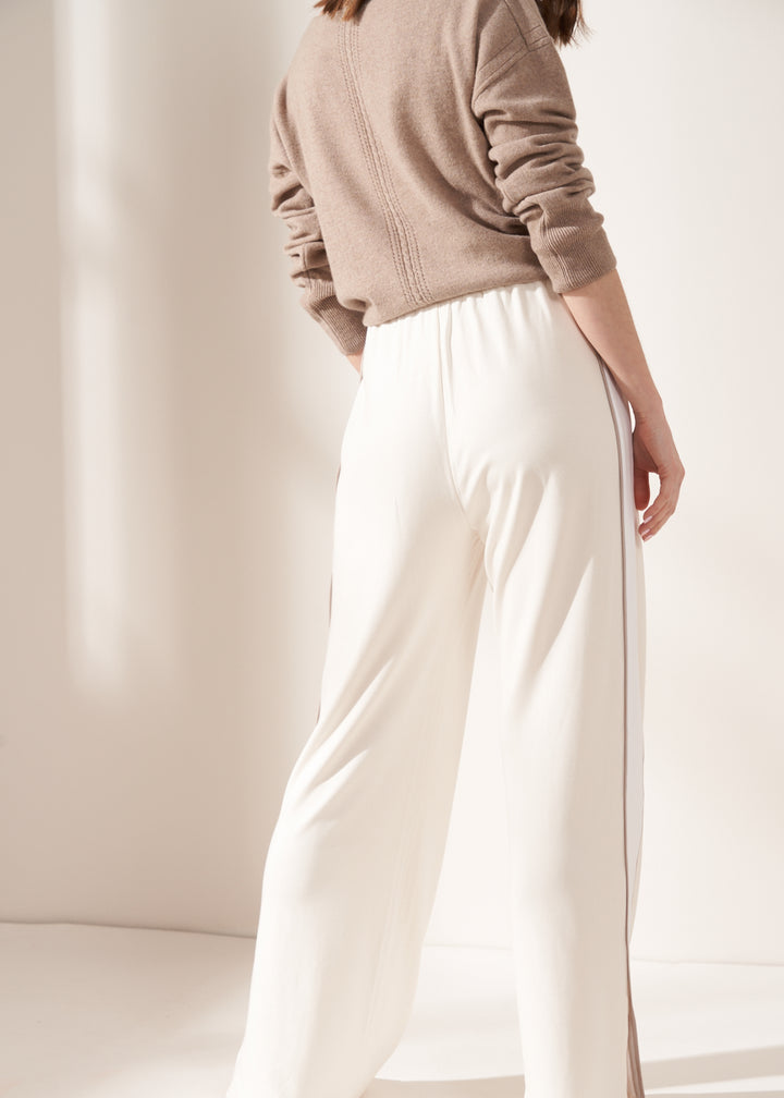 Cream Wide Legged Jogger on Model With Cashmere Jumper from behind | Truly Lifestyle