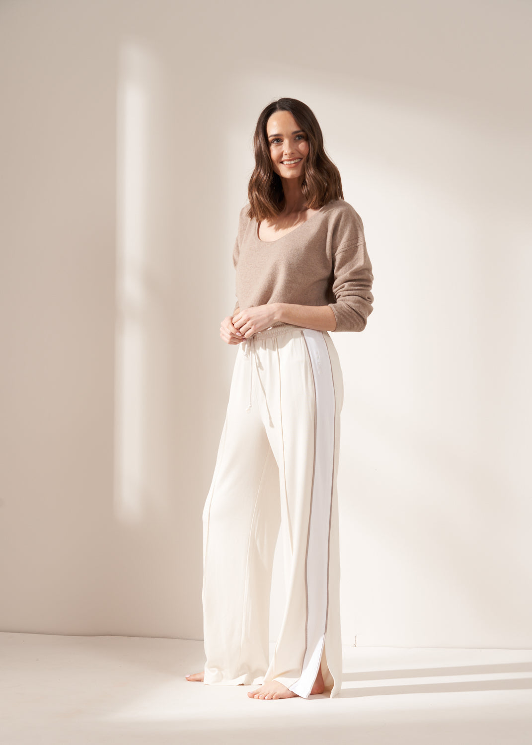 Cream Wide Legged Jogger on Model With Cashmere Jumper | Truly Lifestyle