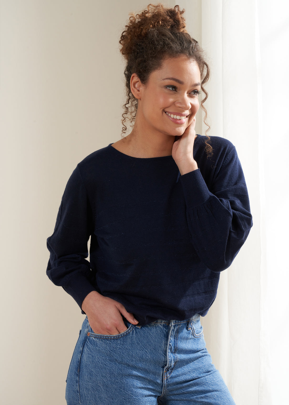 TRULY LIFESTYLE WOMENS NAVY BLUE LUREX STRIPE JUMPER ON MODEL WITH JEANS
