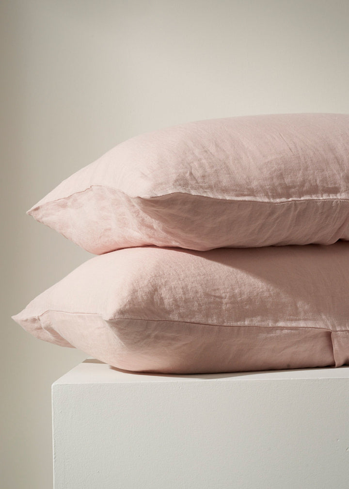 Blush Pink Linen Pillowcases On Pillows | Truly Lifestyle