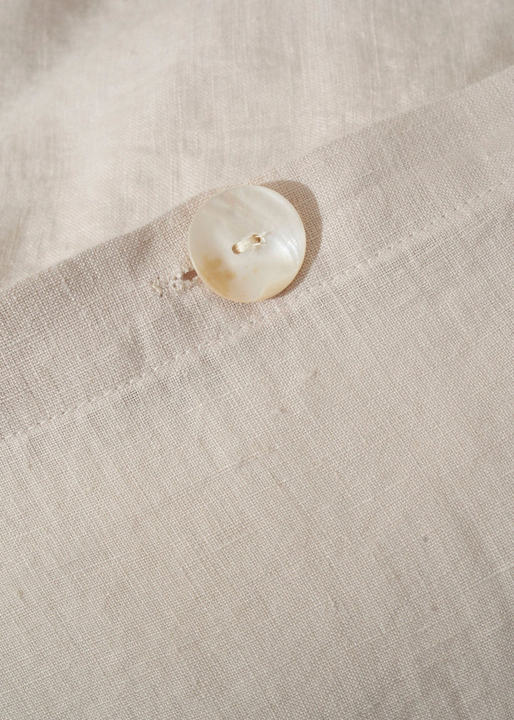 Grey Linen Duvet Cover Close Up Of Button | Truly Lifestyle