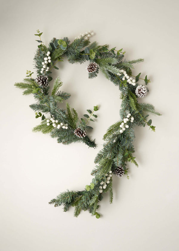 Green Christmas Garland With White Berries and Pine Cones | Truly Lifestyle