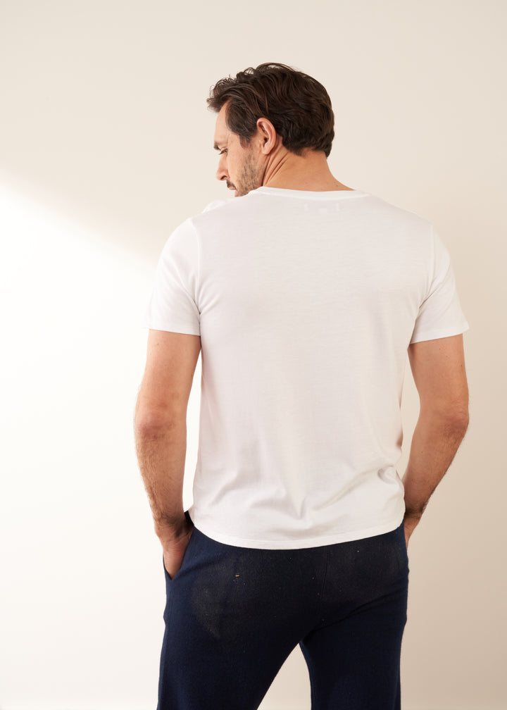 Mens White Bamboo V Neck TShirt On Model With Cashmere Jogging Bottoms From Behind | Truly Lifestyle