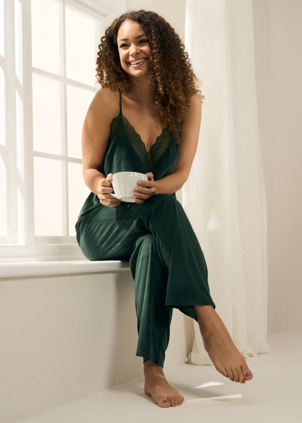 Truly Lifestyle Womens Velour Emerald Pyjama Set On Model Sitting In Window 