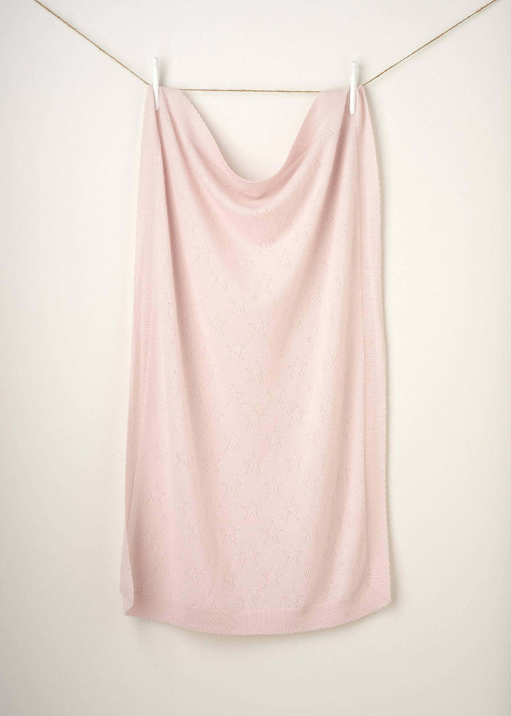 BLUSH PINK CASHMERE BABY BLANKET HANGING UP | TRULY LIFESTYLE